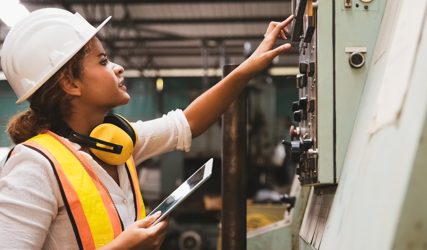 Technician reviewing a system control panel